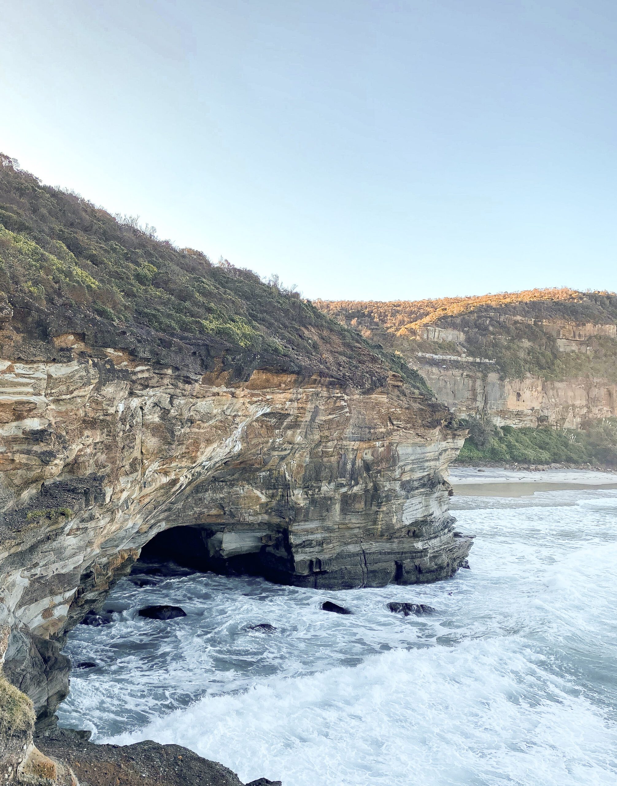 Ghosties beach is a secluded beach and features a sea cave.